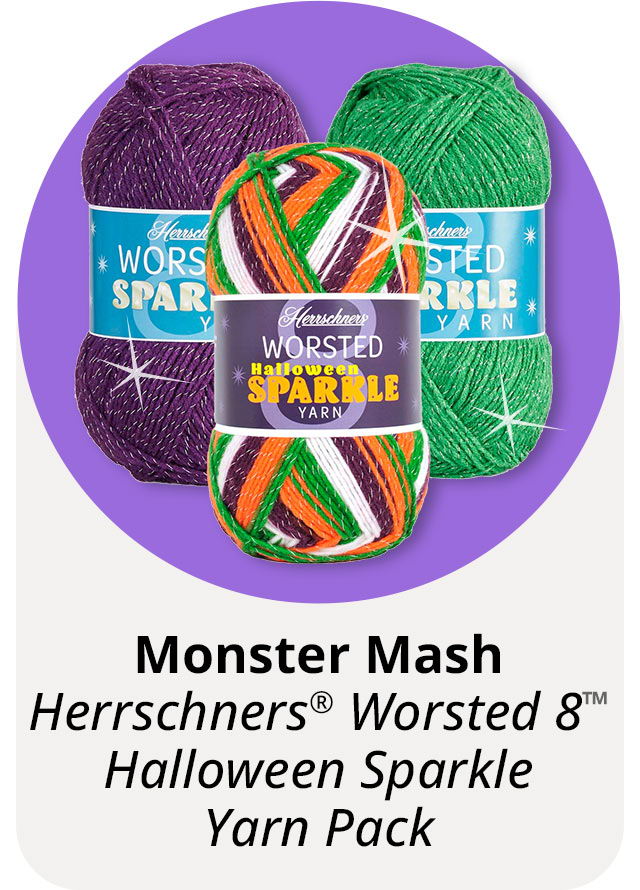 Three yarn balls in Halloween colors with 