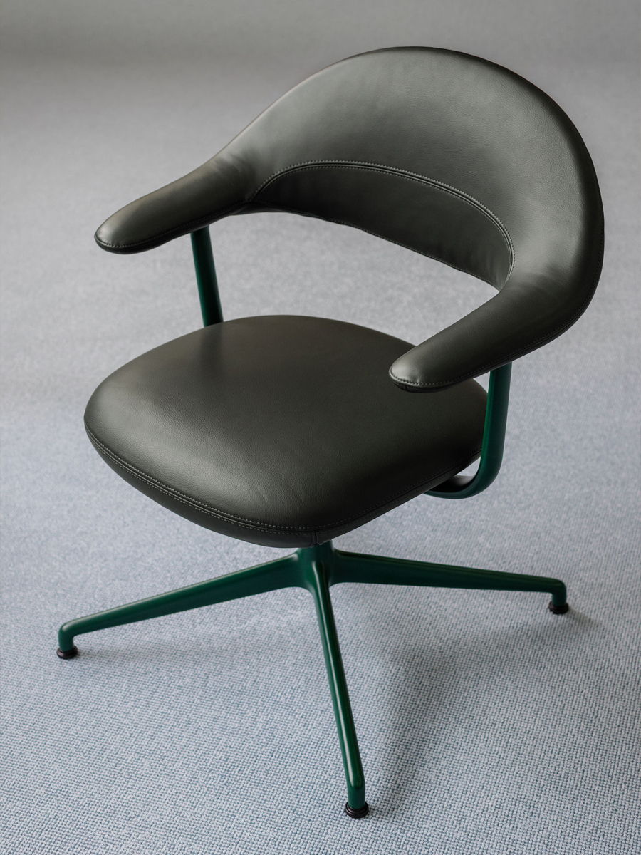 A modern MYNT swivel office chair with a cushioned seat and armrests.