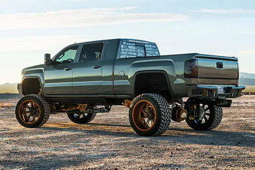 Onboard air compressor tank or plumbing for Conductor's Special 244K spare tire delete kit on Elite Customs 775's 2016 GMC Denali Mega Cab gallery photo 3