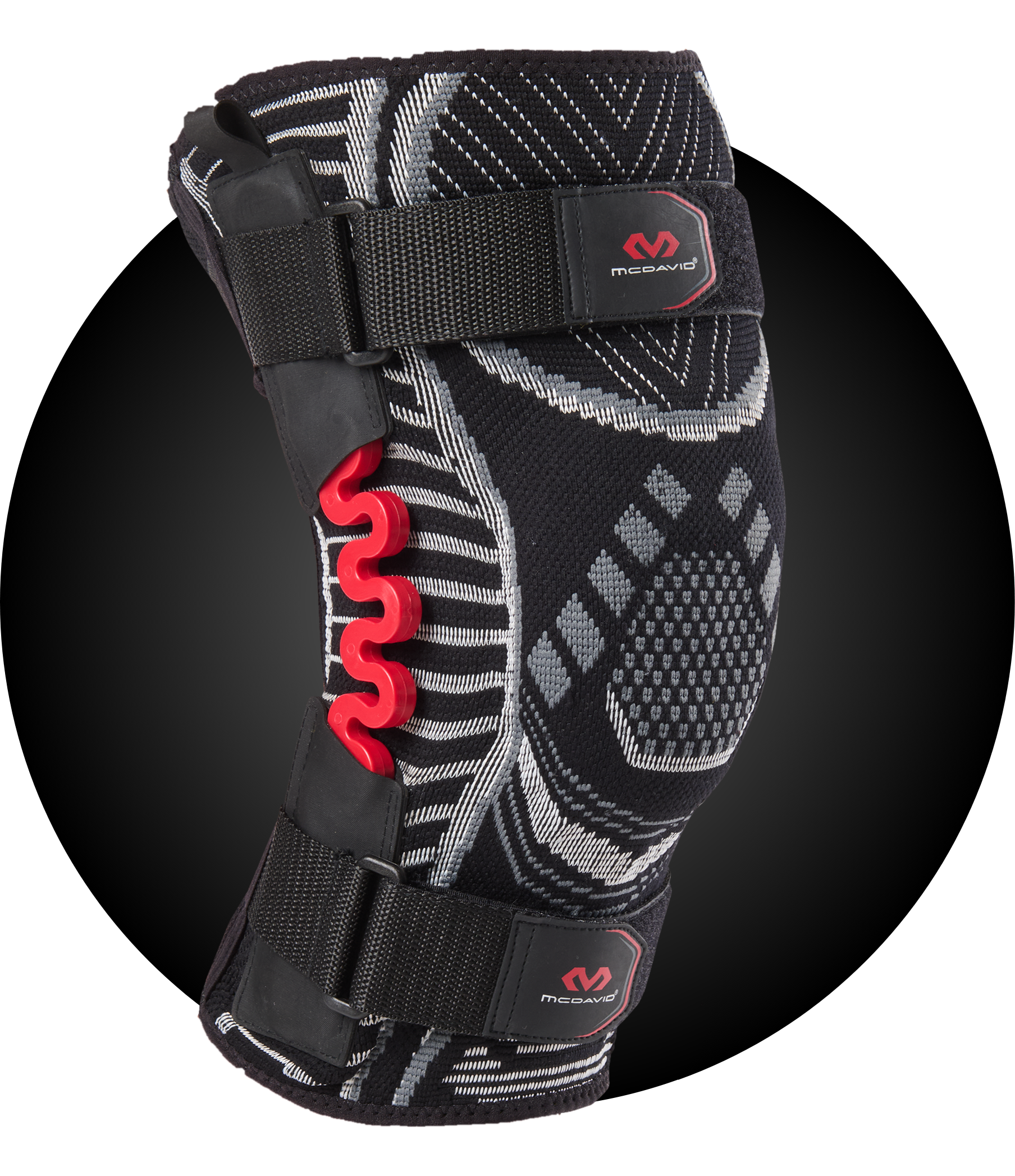 Black and red knee brace with adjustable straps and textured design.