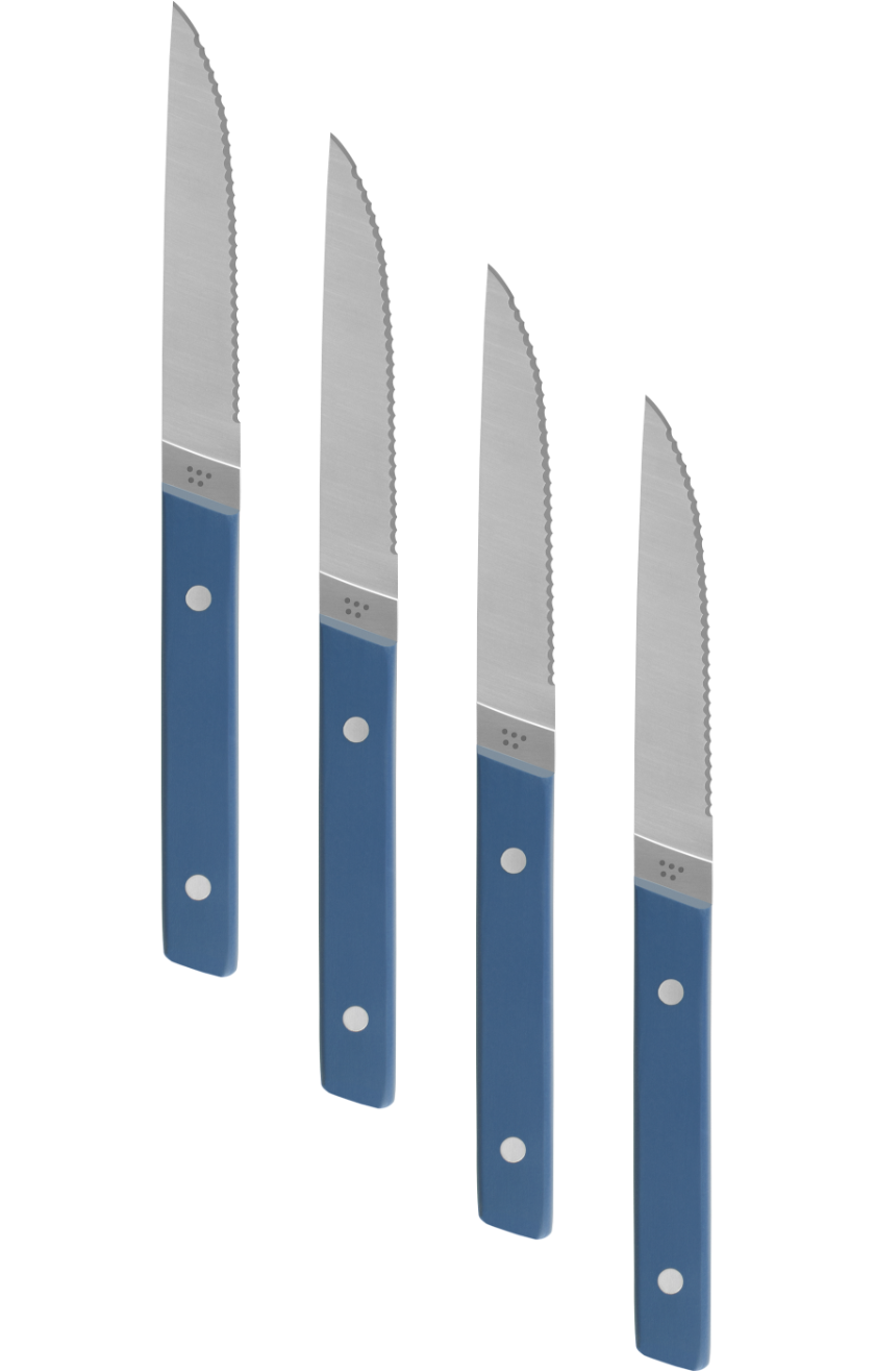 Four Blue Misen Steak Knives seen from above, laid flat in a diagonal line.