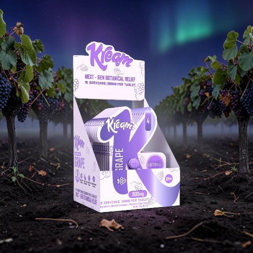 Klean product packaging displayed in a vineyard with northern lights backdrop.