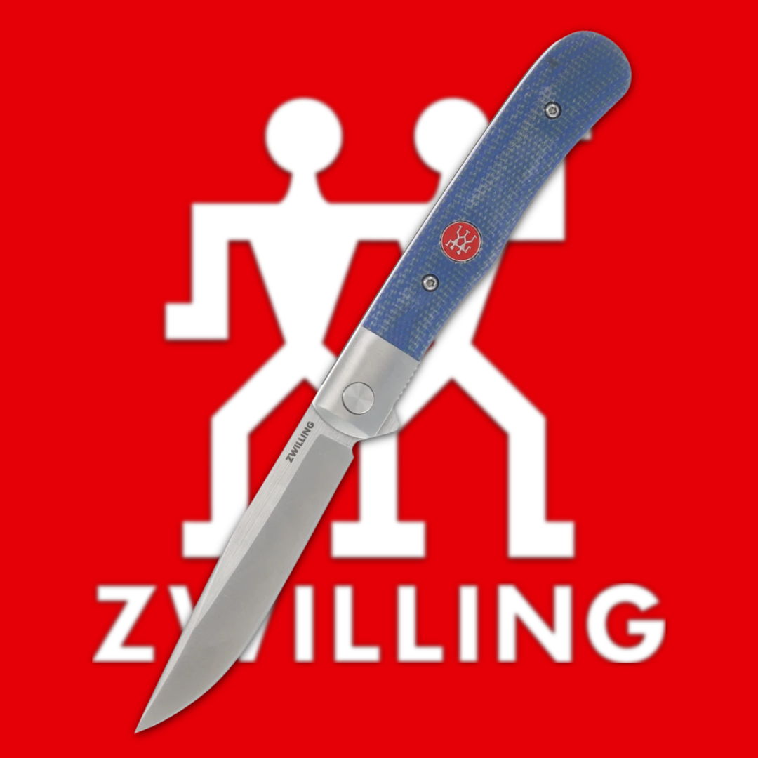 Zwillings knife on a red background with the brand logo.