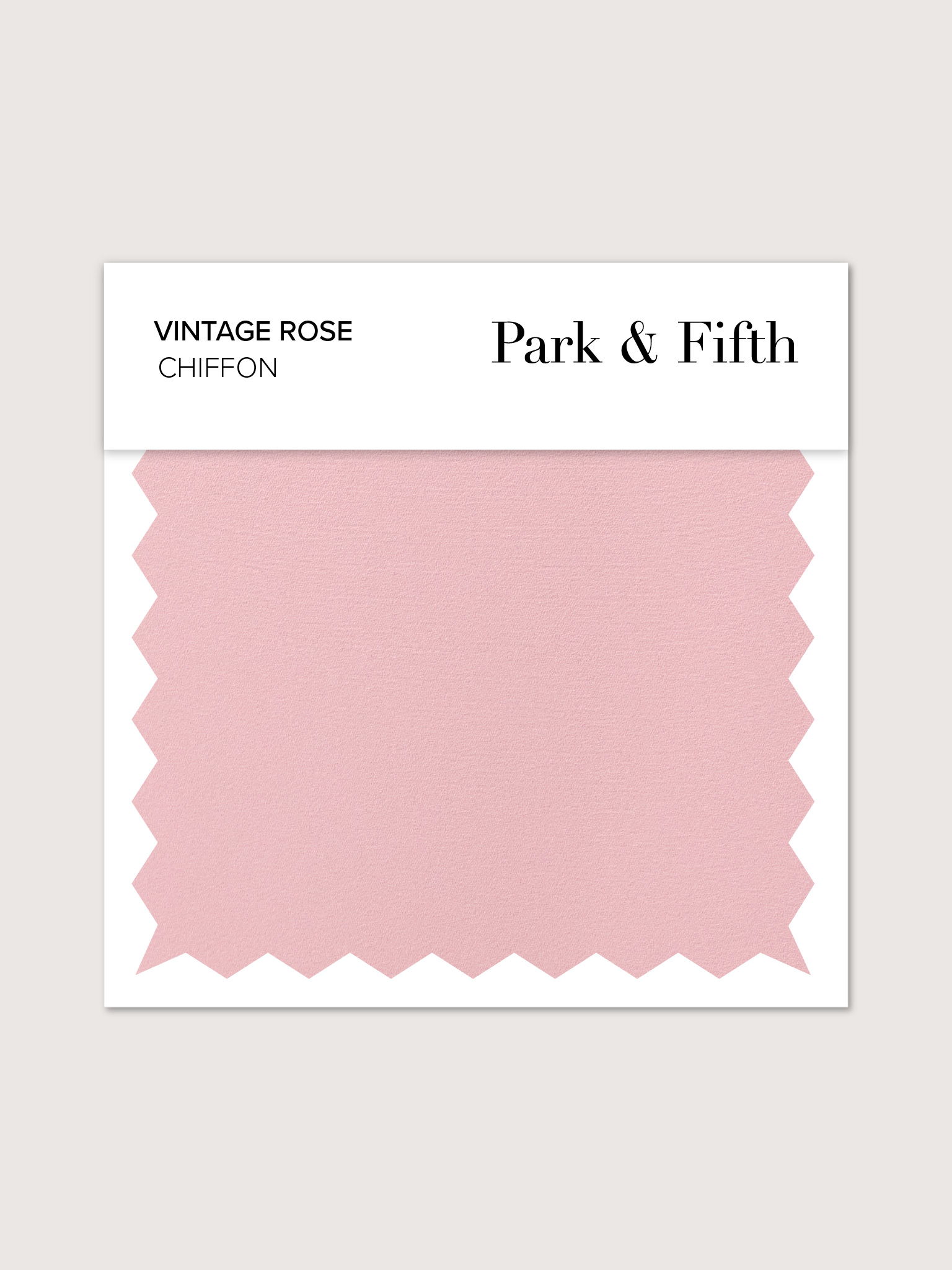 Swatch of vintage rose chiffon fabric on a display card.