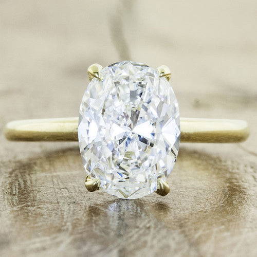 oval 2 carat diamond ring - yellow gold