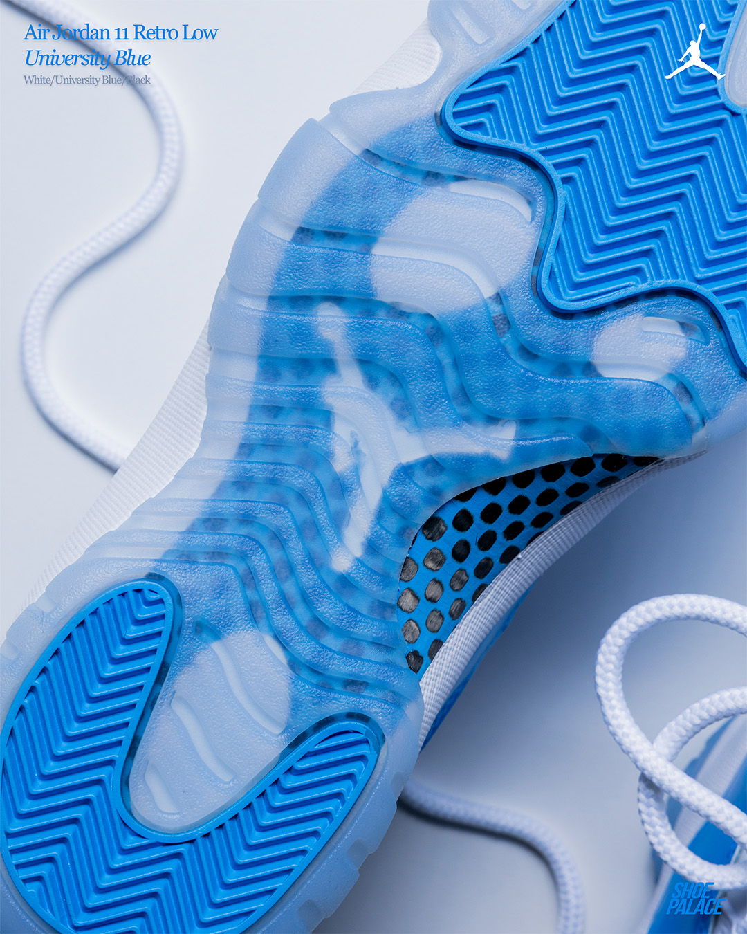 Blue athletic shoes with a prominent logo and white laces.