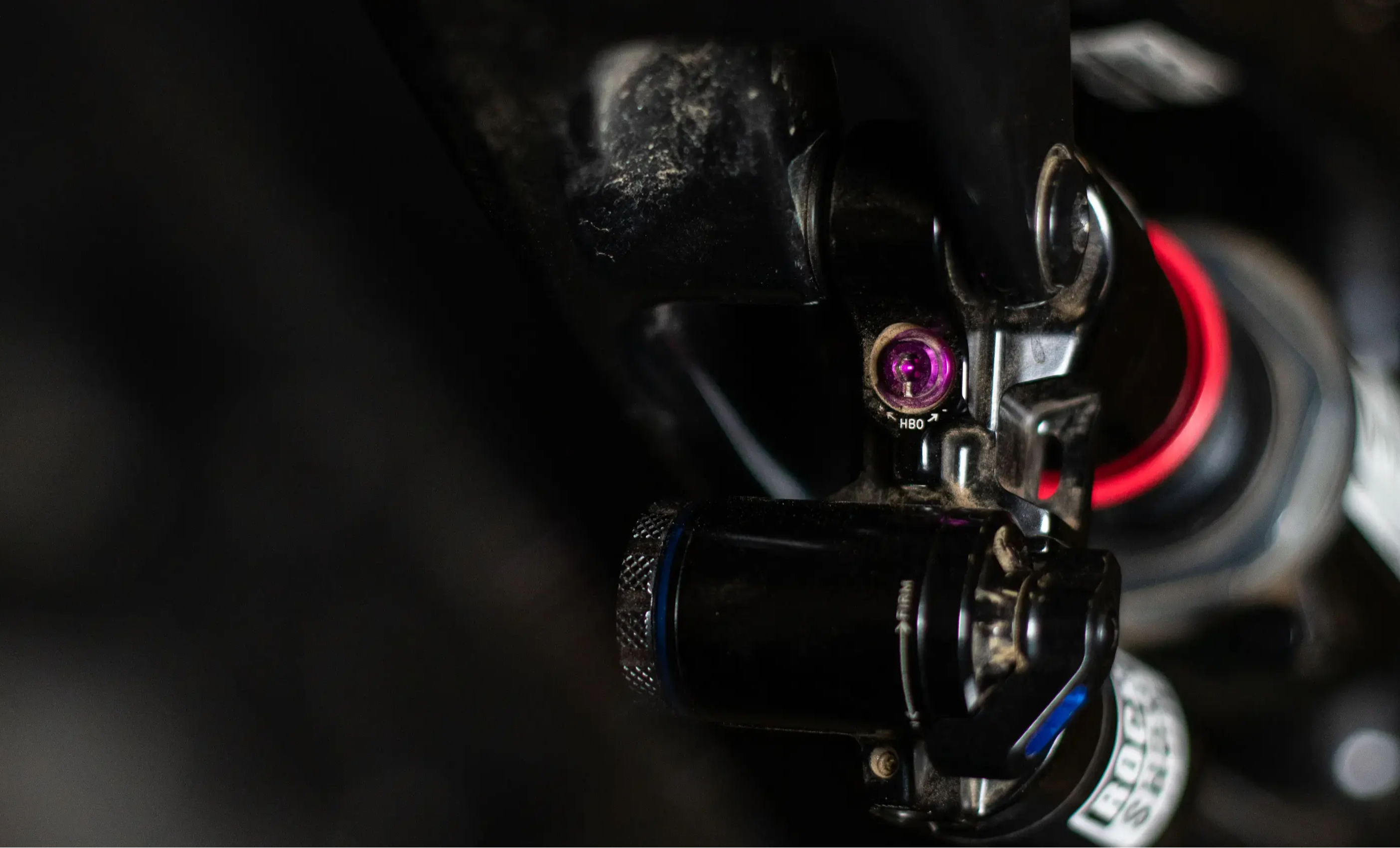 detail of the hydraulic bottom out adjuster on a rockshox vivid ultimate rear shock on a specialized stumpjumper mountain bike for the vivid overview and first looks