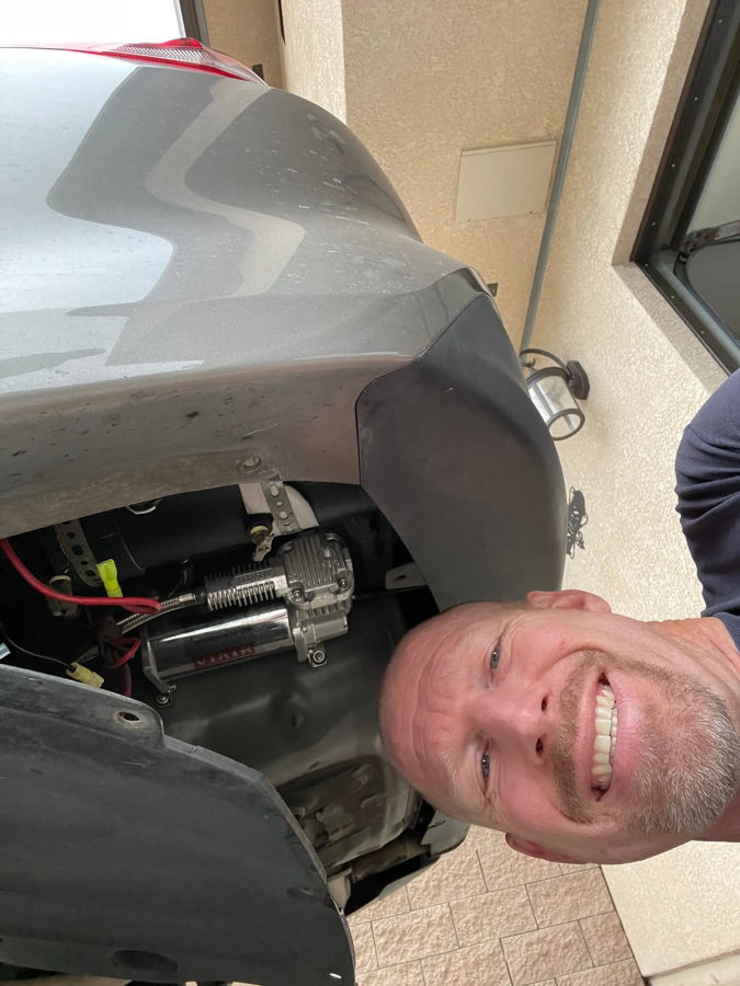 VIAIR air compressor mounted behind rear bumper of Jeff's 2016 Kia Optima photo 4