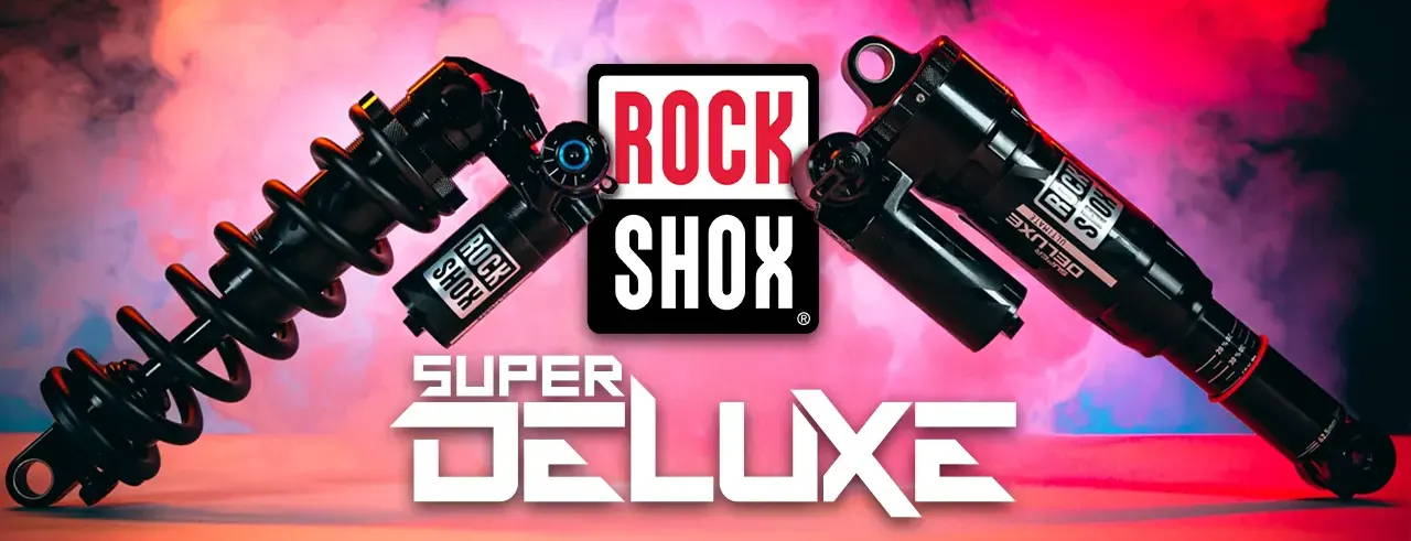 RockShox Super deluxe ultimate air and coil on a smokey background with a rockshox logo