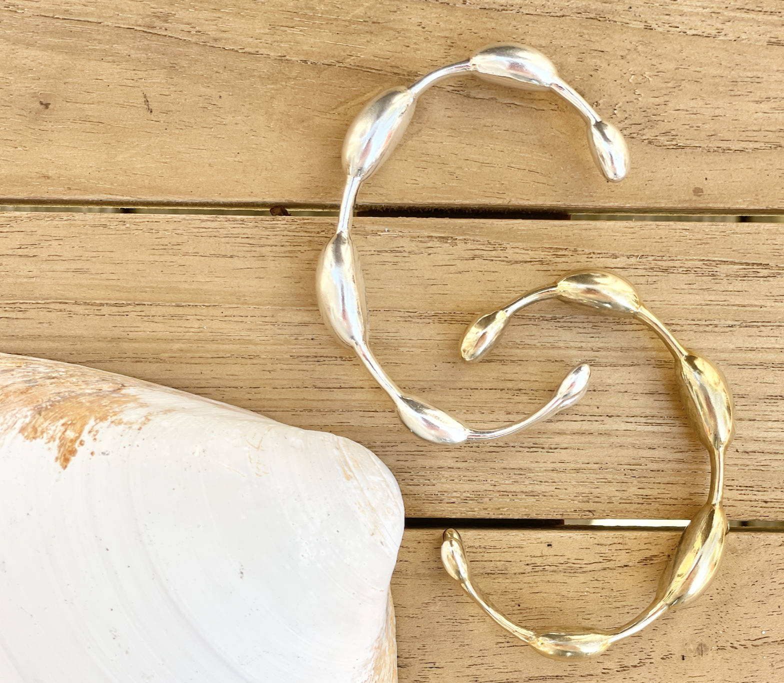 Brass and silver seaweed bracelets with clam shell