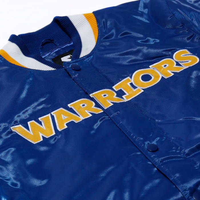 close up of warriors blue jacket
