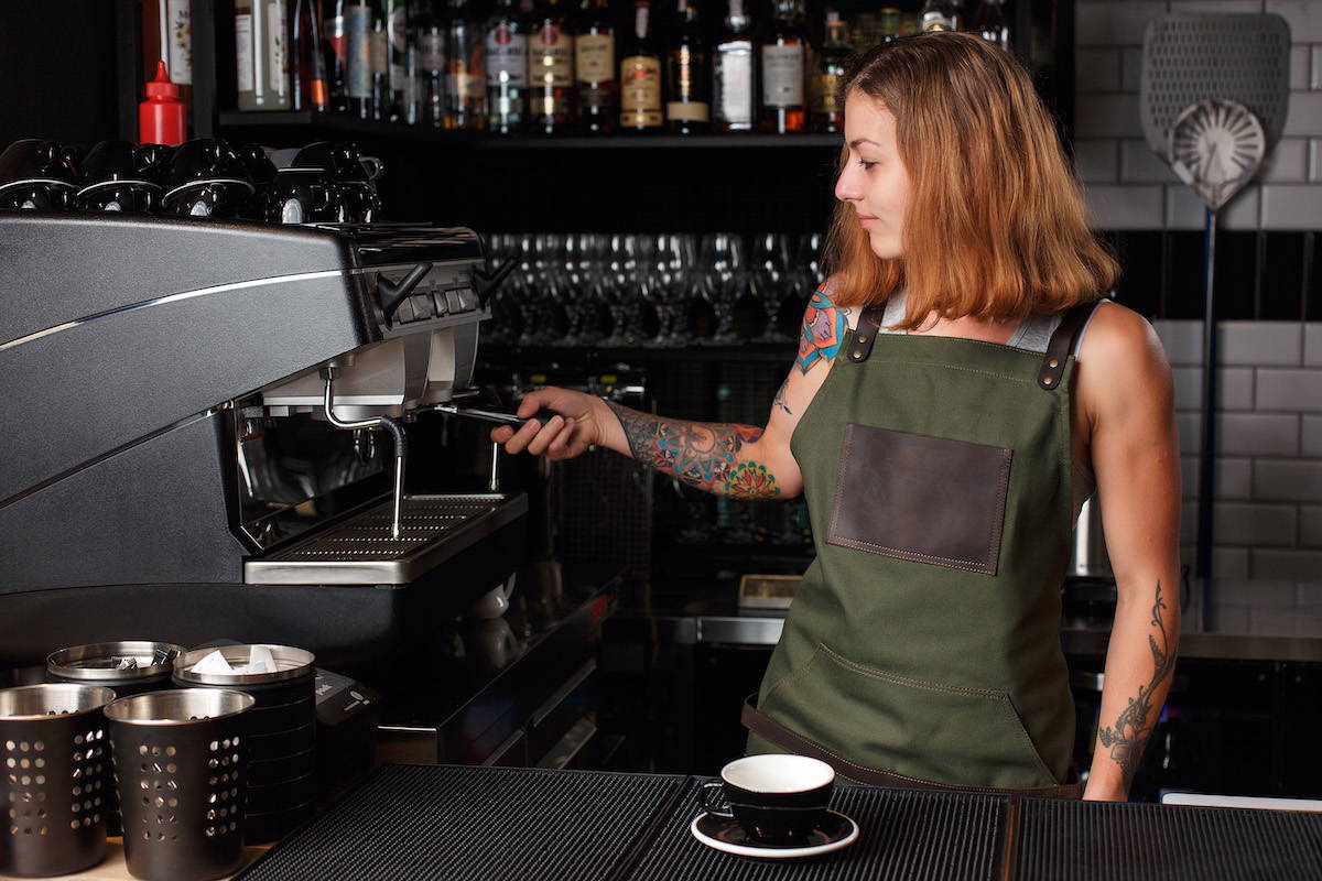 green barista apron with pockets