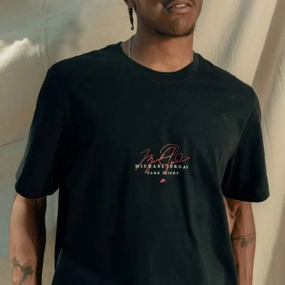 male wearing black jordan t shirt