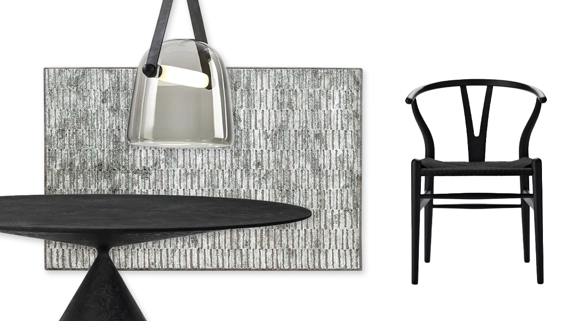 Modern CH24 dining setup with a black table, chair, and abstract wall art.