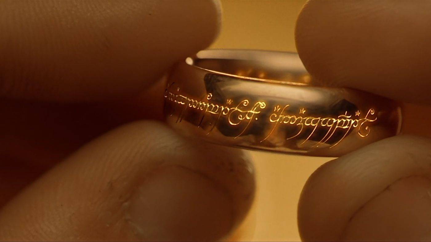 hand holding a ring close-up image