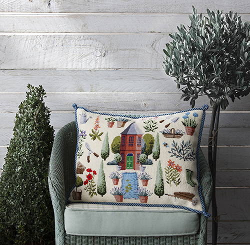 Chelsea Eccentric Garden needlepoint cushion on  chair