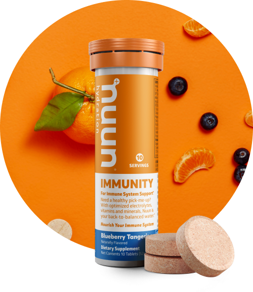 Nuun Immunity tube with tabs and mandarin oranges and blueberries