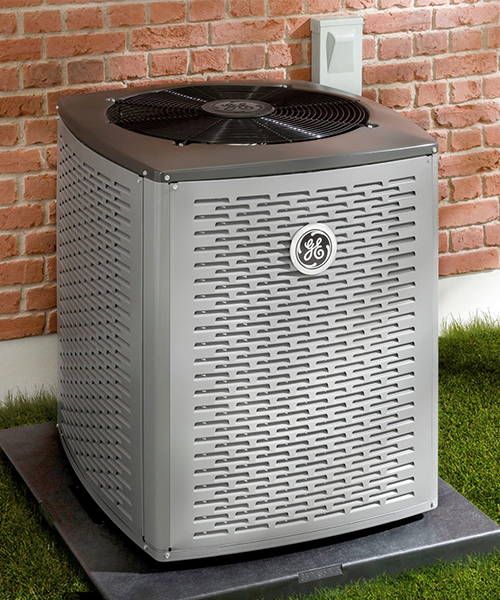 Image of GE Residential HVAC Inverter Heat Pump, installed outside of a home