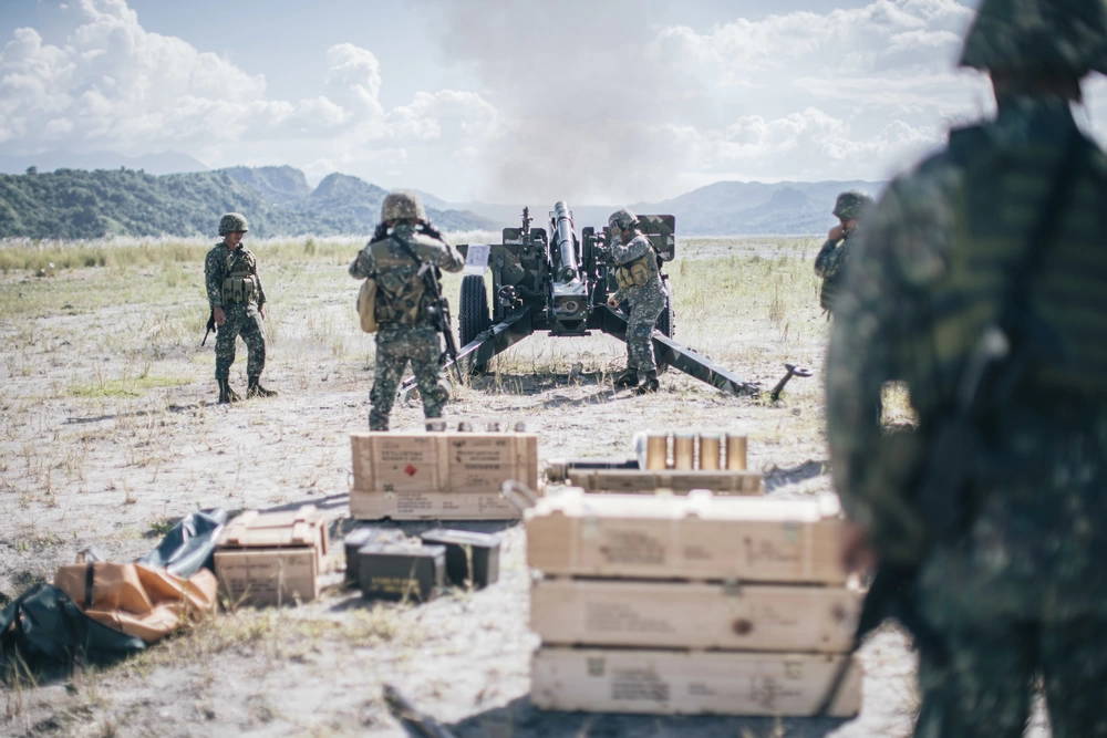 Philippine Marines with the 17th Marine Corps Field Artillery Battalion fire an M102 105 mm howitzer during exercise KAMANDAG 3 at Colonel Ernesto Ravina Air Base, Philippines, Oct. 15, 2019. KAMANDAG advances military modernization and capability development through subject matter expert exchanges. (U.S. Marine Corps photo by Staff Sgt. Donald Holbert)
