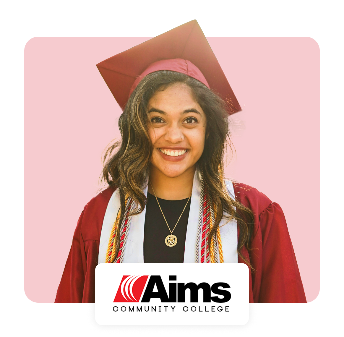 Smiling graduate in cap and gown with Aims Community College logo.