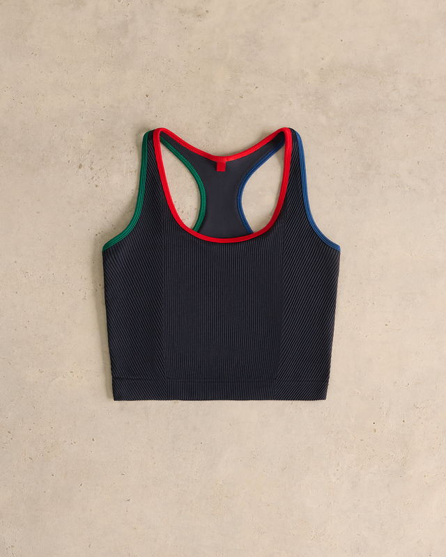 A navy sports bra with colorful trim.