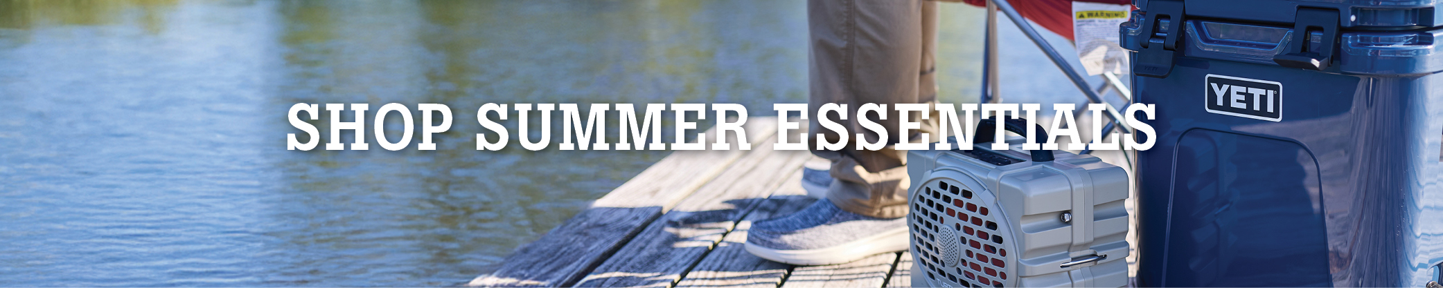 Text promoting summer essentials alongside a lakeside setting.