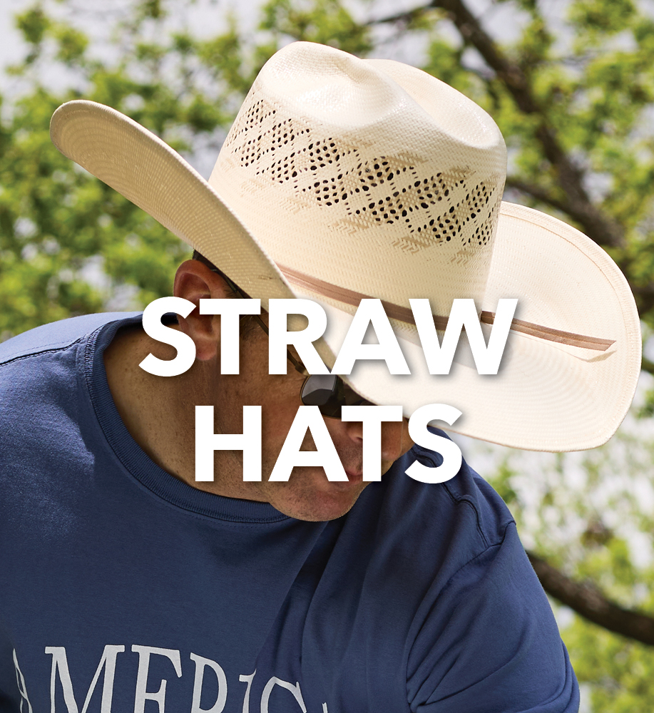 Person wearing a straw hat outdoors with trees in the background.