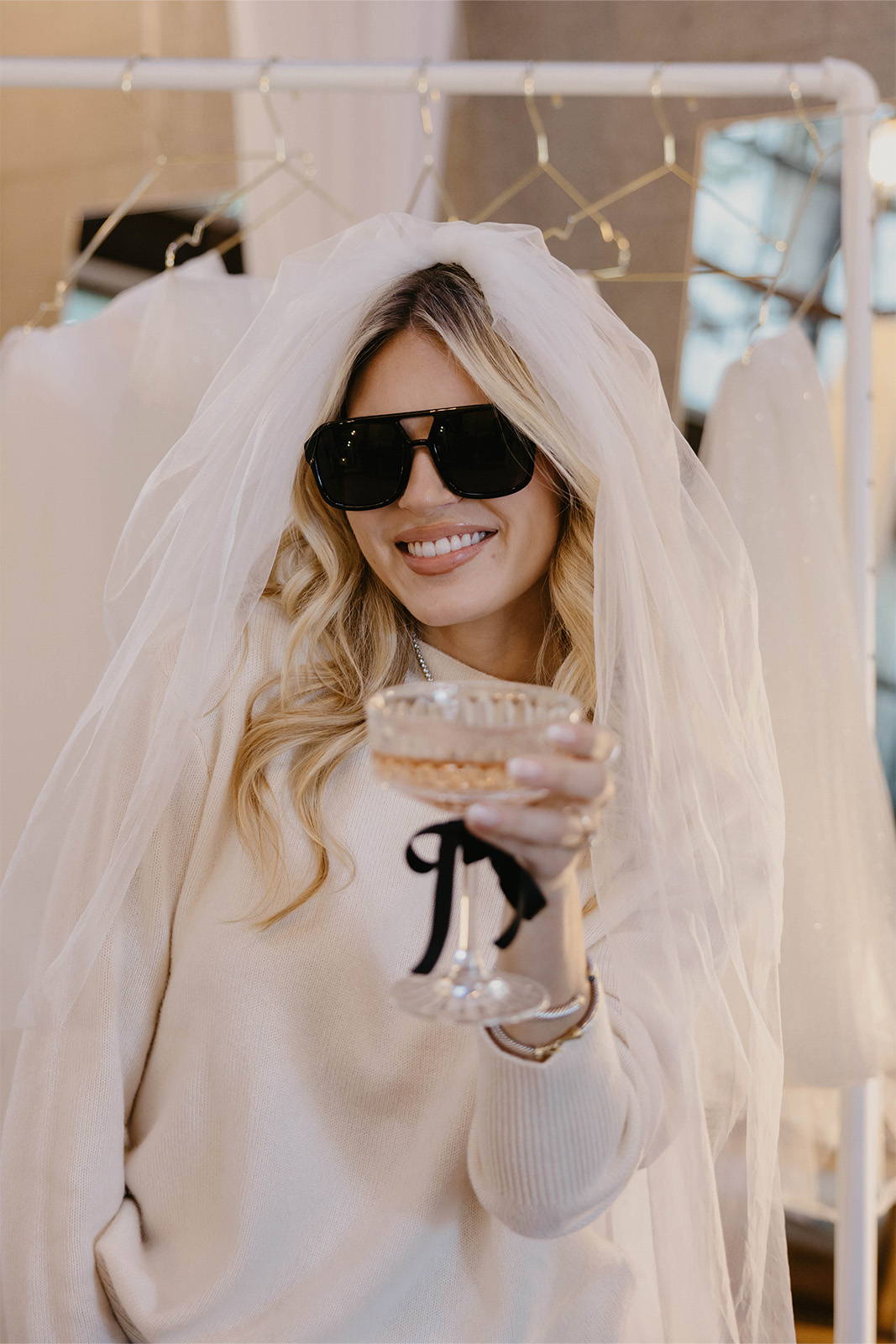 Guest with sunglasses and veil