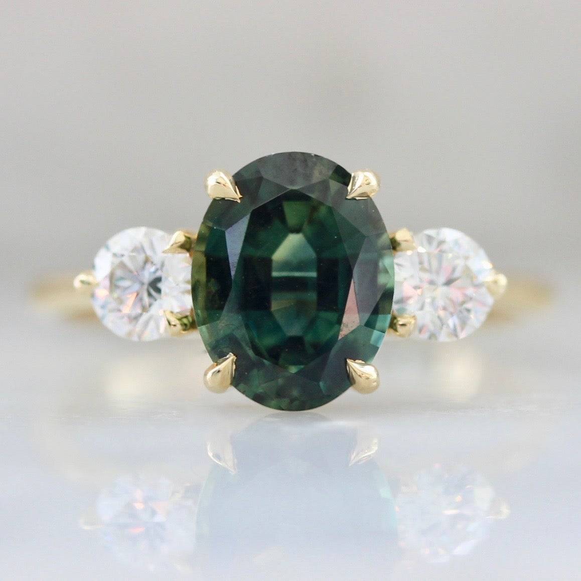 green sapphire 3 stone engagement ring