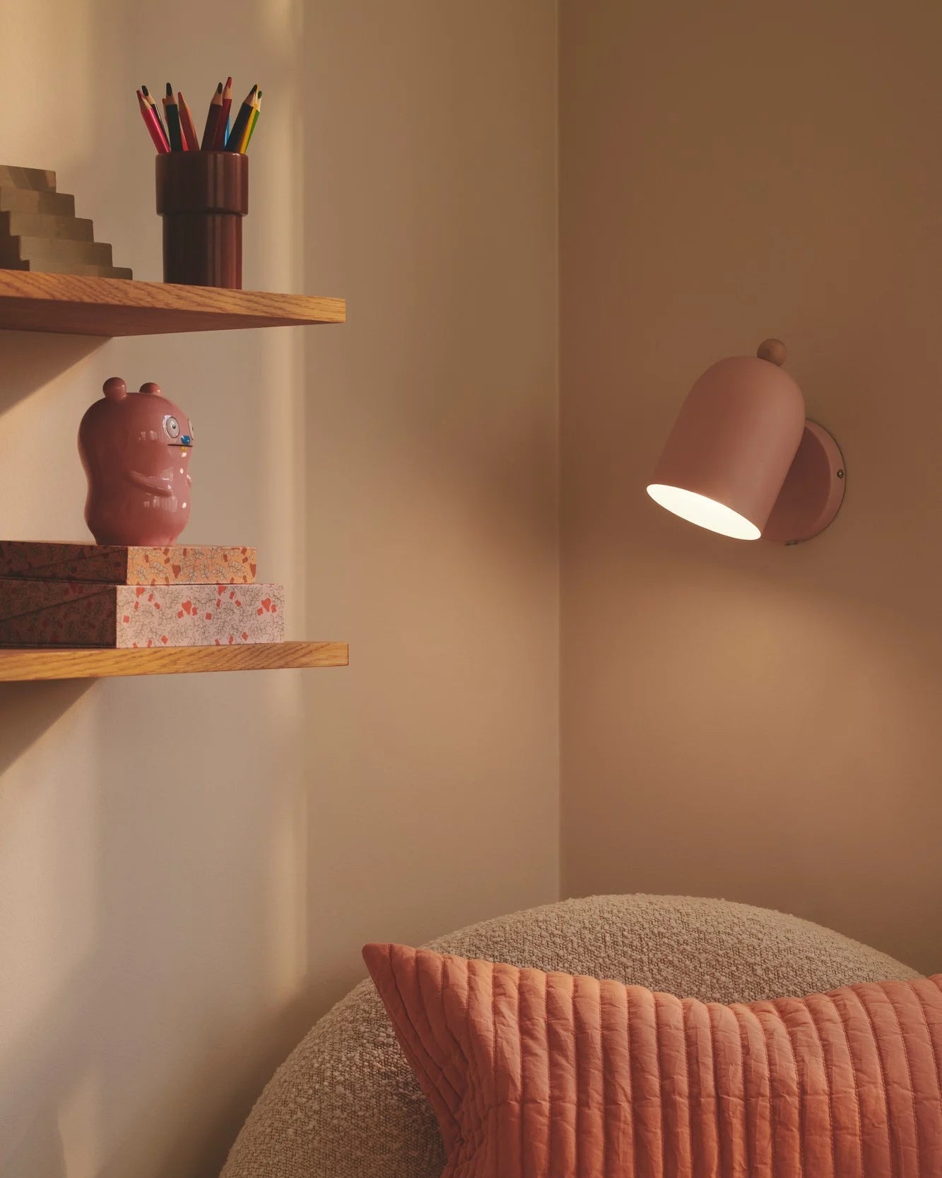 Pastel Nordic Adjustable Wall Light finished in Dusty Rose featured in an autumn colour toned room - Lighting Collective 