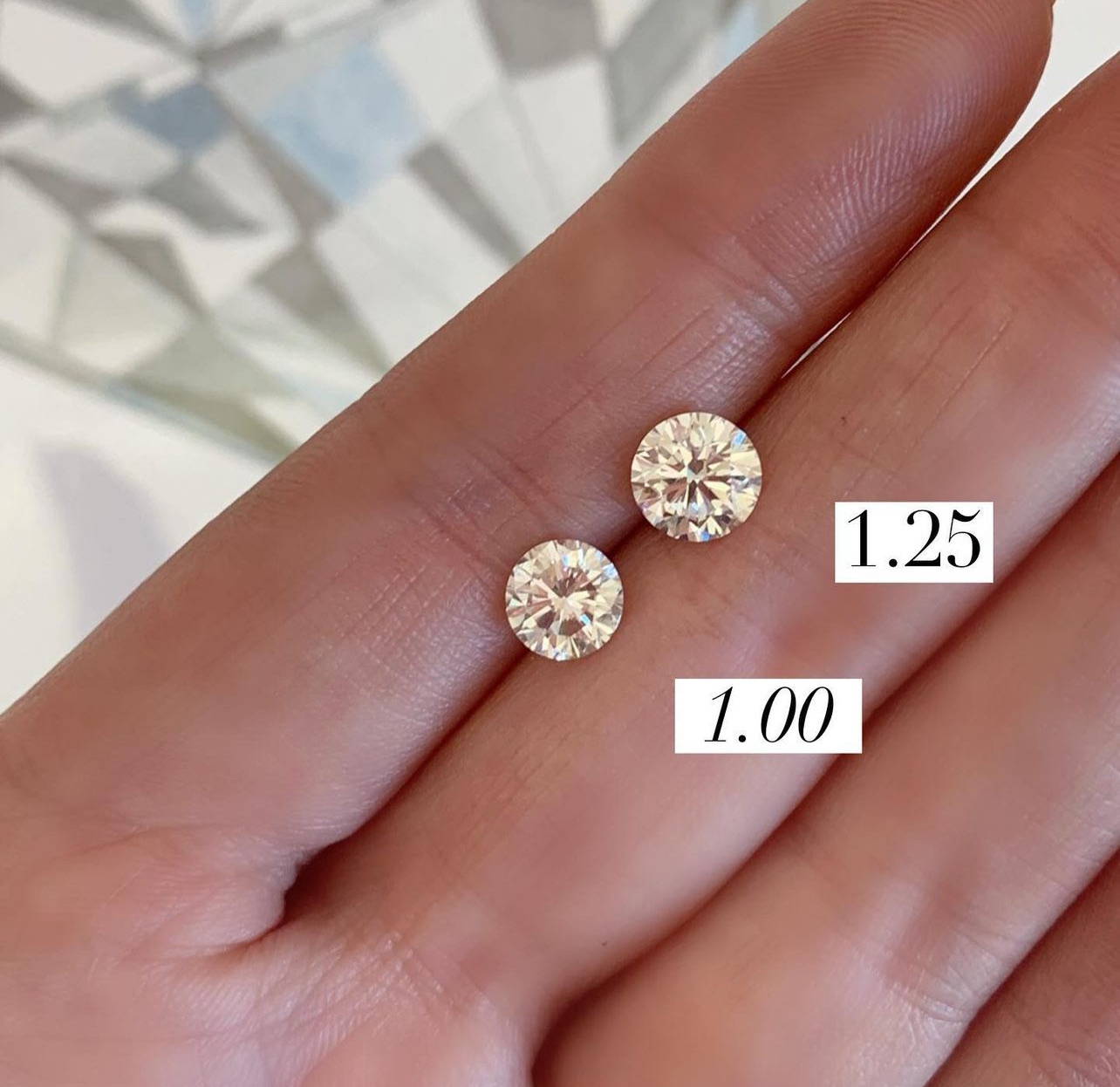 round diamond carat sizes on a hand - 1 carat vs 1.25 carat