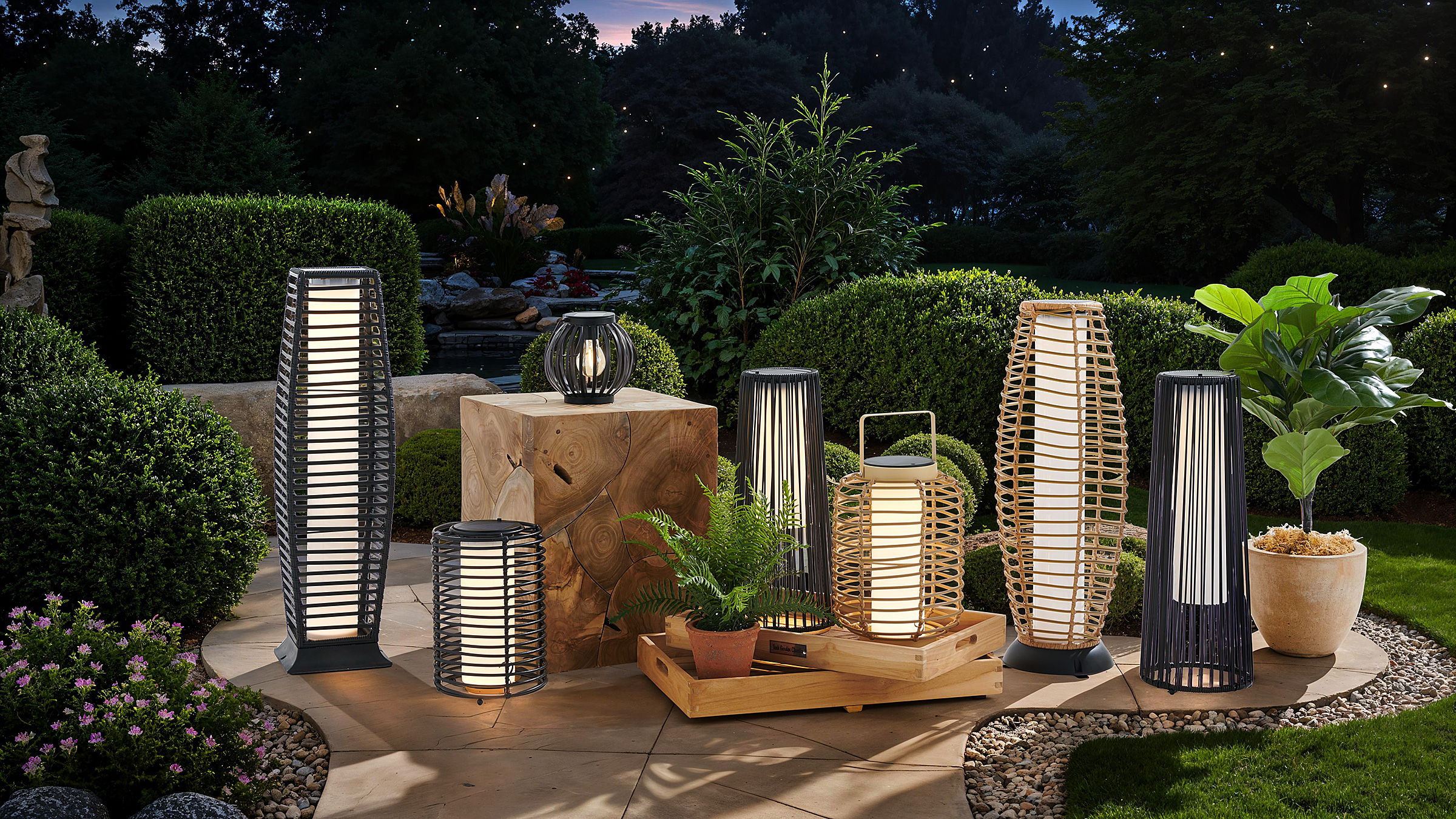 Outdoor scene with decorative lanterns and plants in a garden setting.
