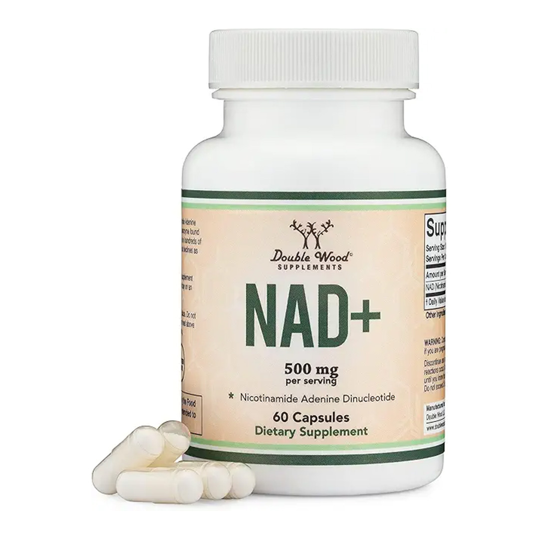 Blurry image of a supplement bottle with a green label.