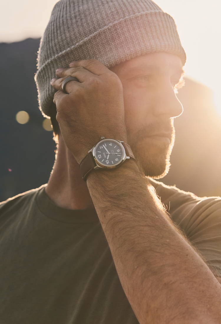 man wearing the ridge titanium field watch