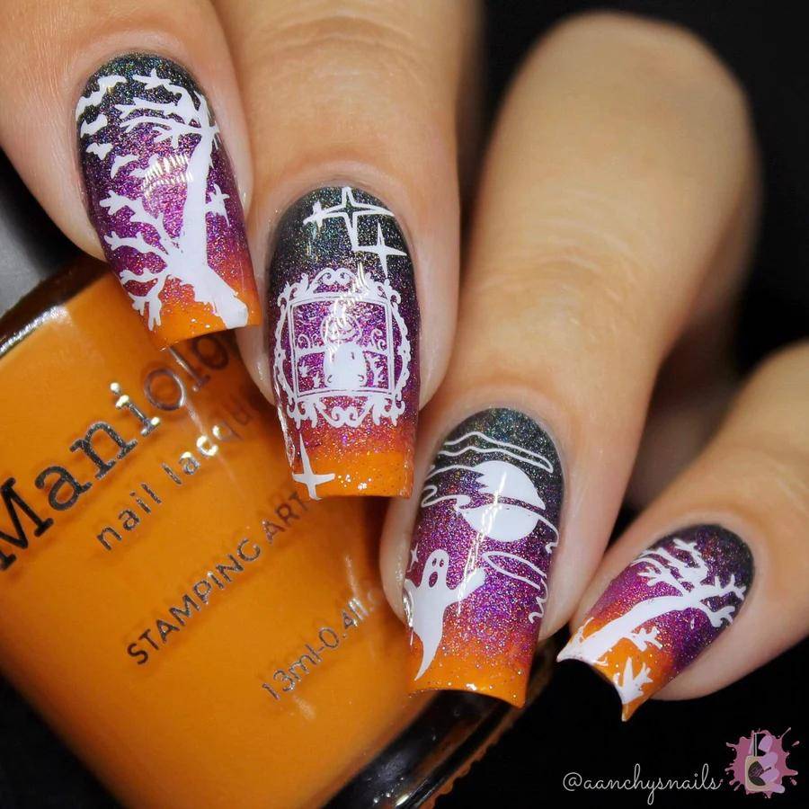 Add spider webs to your cute halloween nails for a spooky scene with contrasting colors
