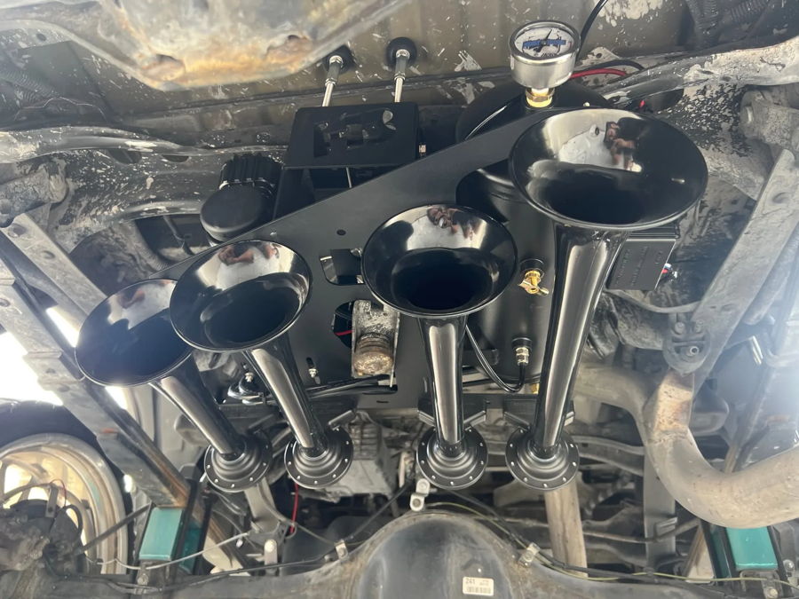 Four black train horns undercarriage air tank pressure gauge frame mount Trevor's 2005 Toyota 4 Runner Dixie musical horn gallery photo 4