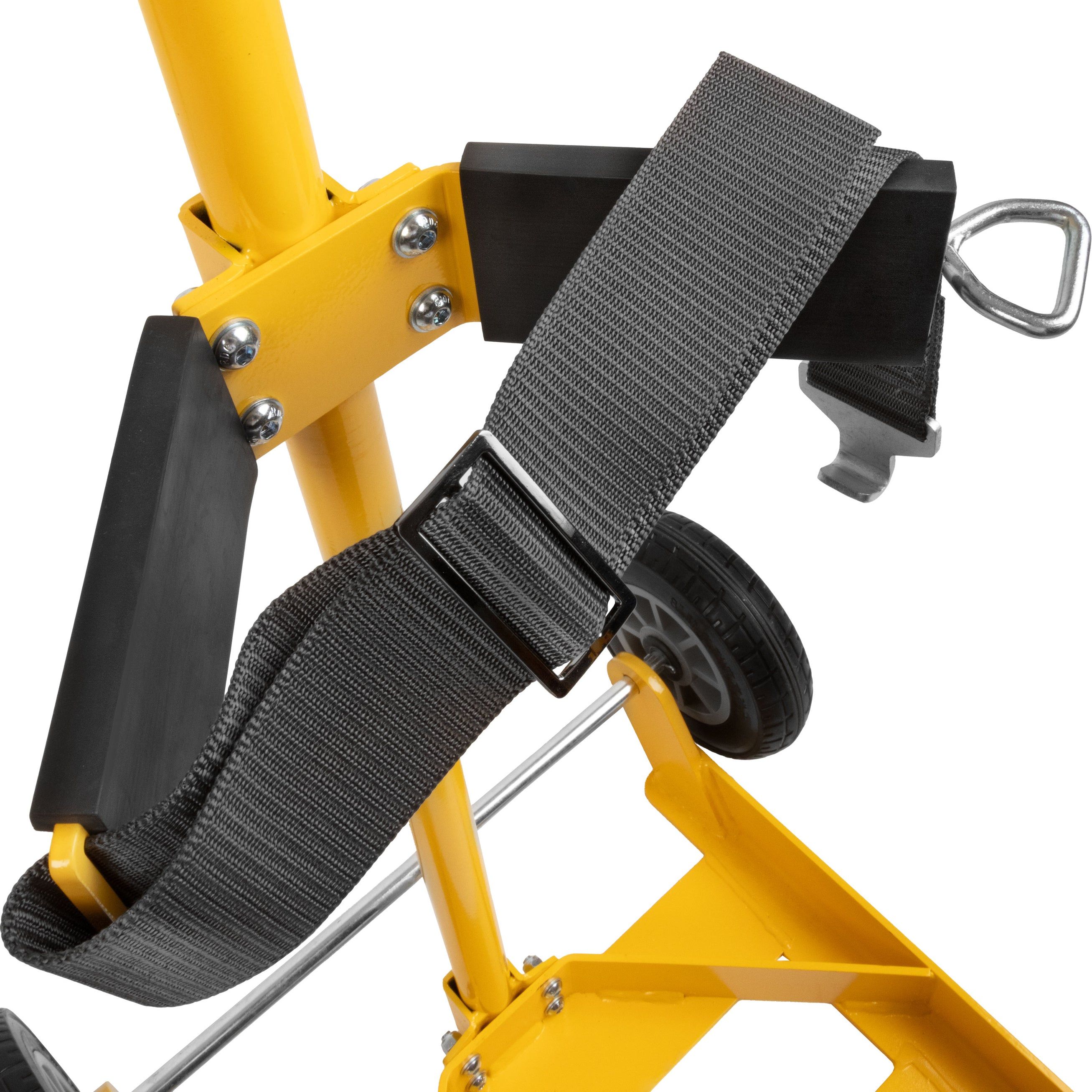Close-up of a yellow cart's strap and fastening mechanism.