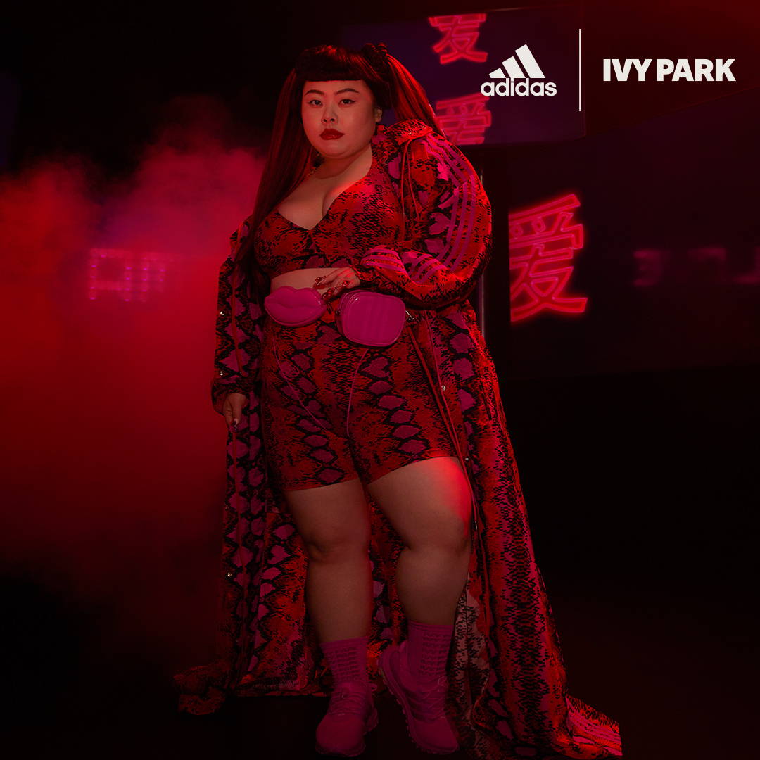 model wearing red ivy park apparel