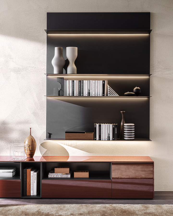Modern Molteni & C Pass-word shelving unit with decorative items and books in a stylish interior.