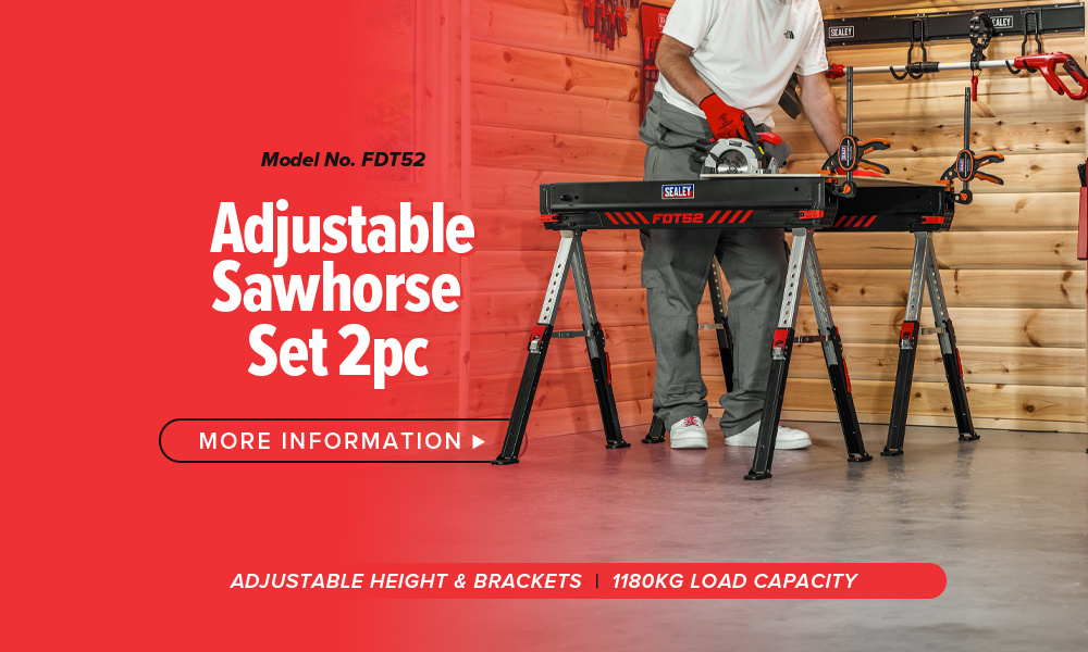 Adjustable sawhorse set displayed in a woodworking environment.