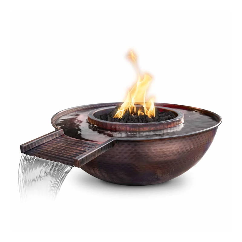 A round shaped fire and water bowl that is made of hammered copper finish.