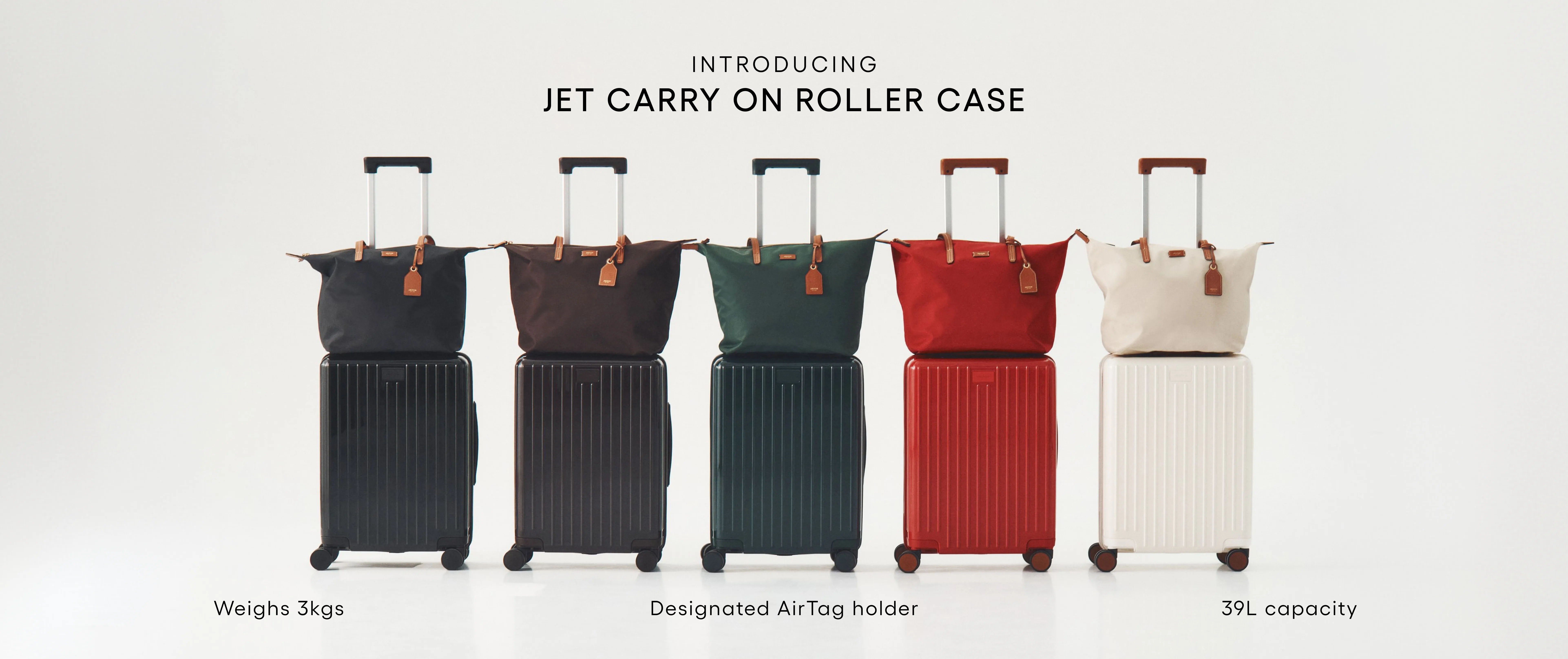Five different carry-on roller cases in various colors.