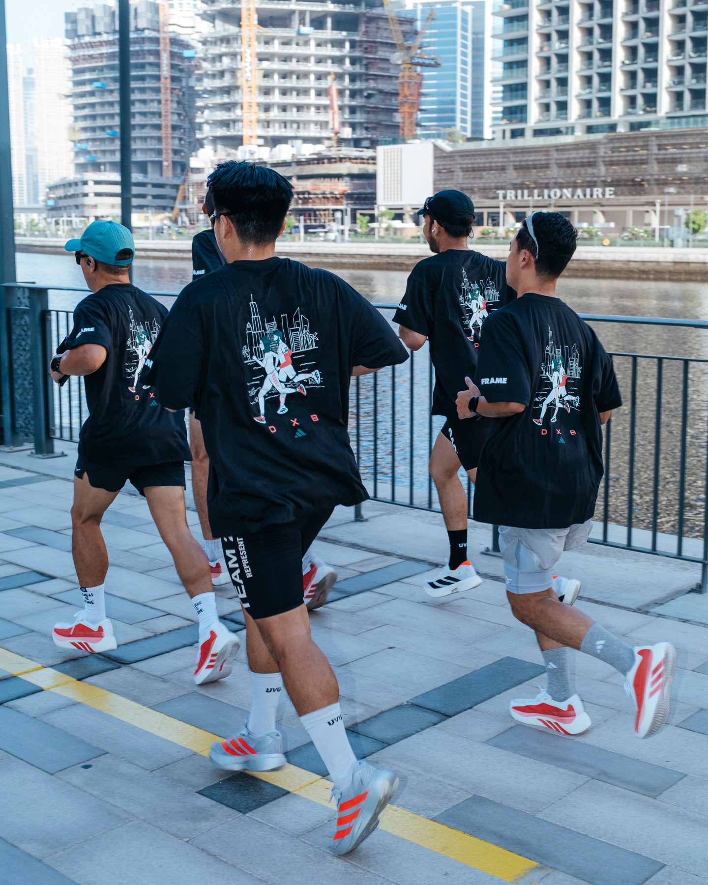 FRAME RUN CLUB runners along the Dubai Canal