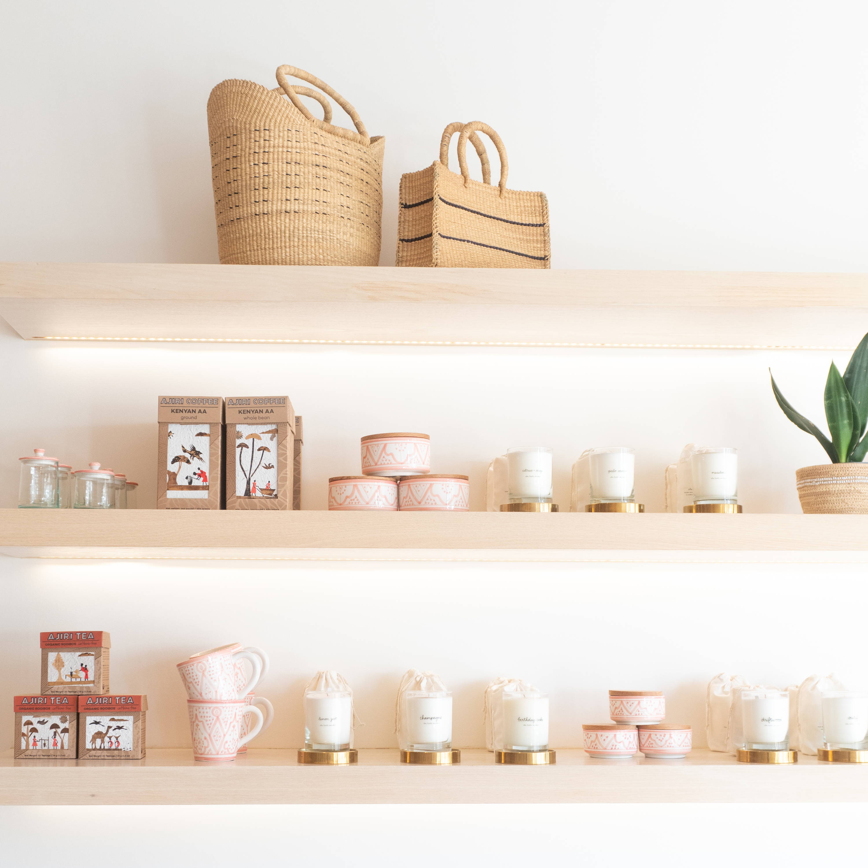 Savanna baskets, candles, teas, ceramics on shelving | The Little Market