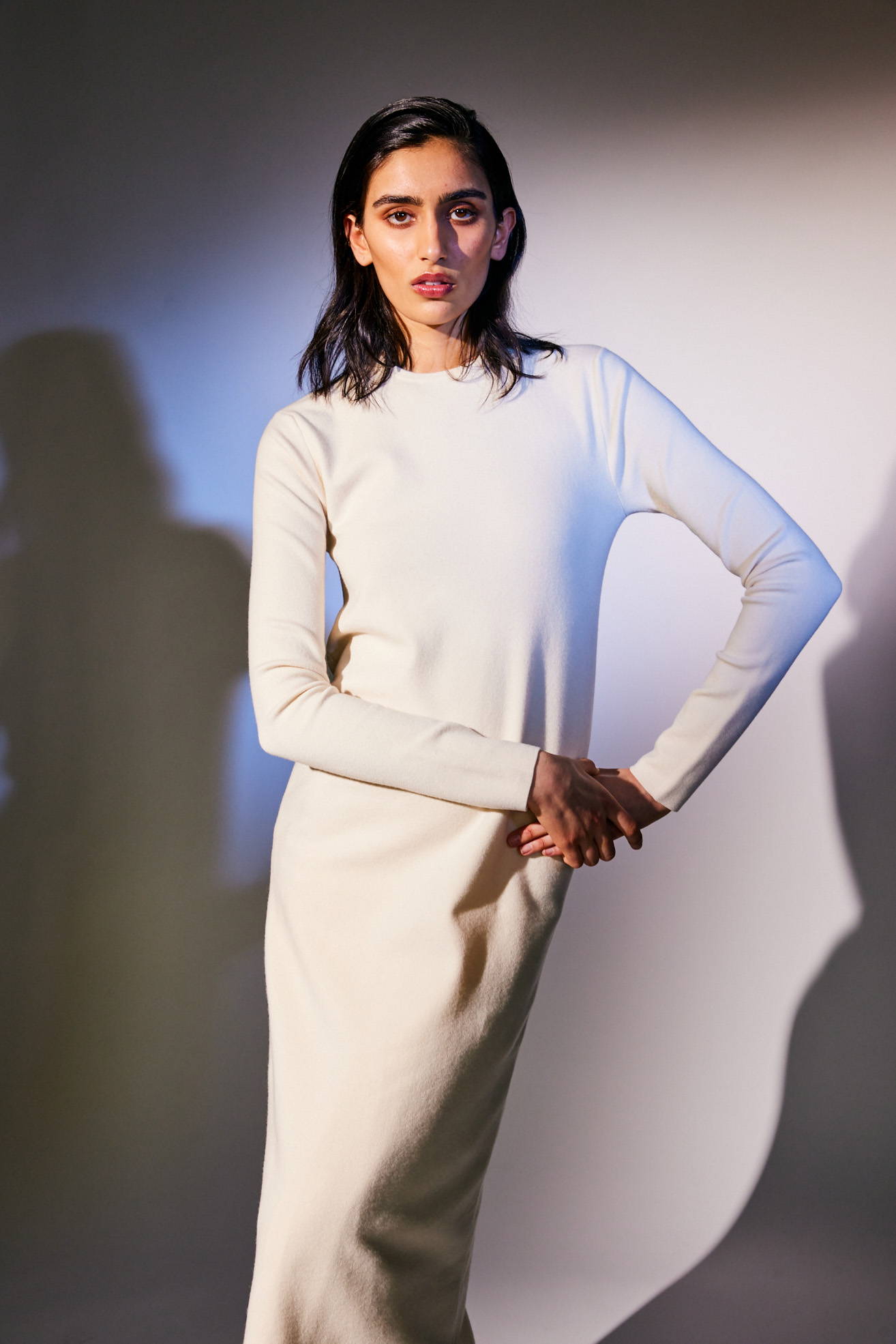model standing on white background