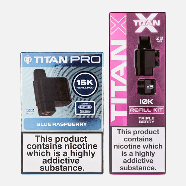 Two vape product boxes with warning labels about nicotine addiction.