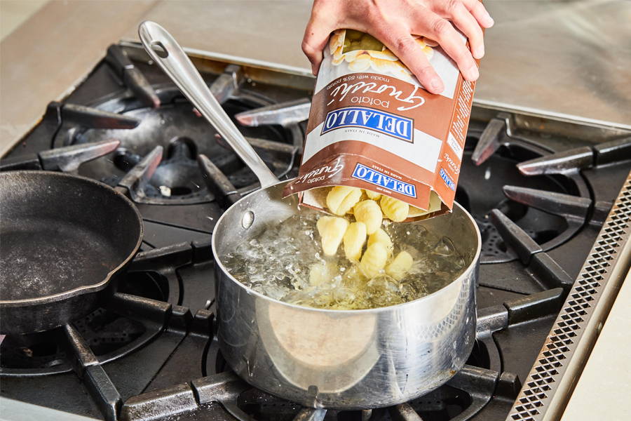 Image showing the process of boiling gnocchi.