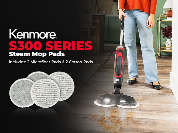 A person uses a steam mop on hardwood floors