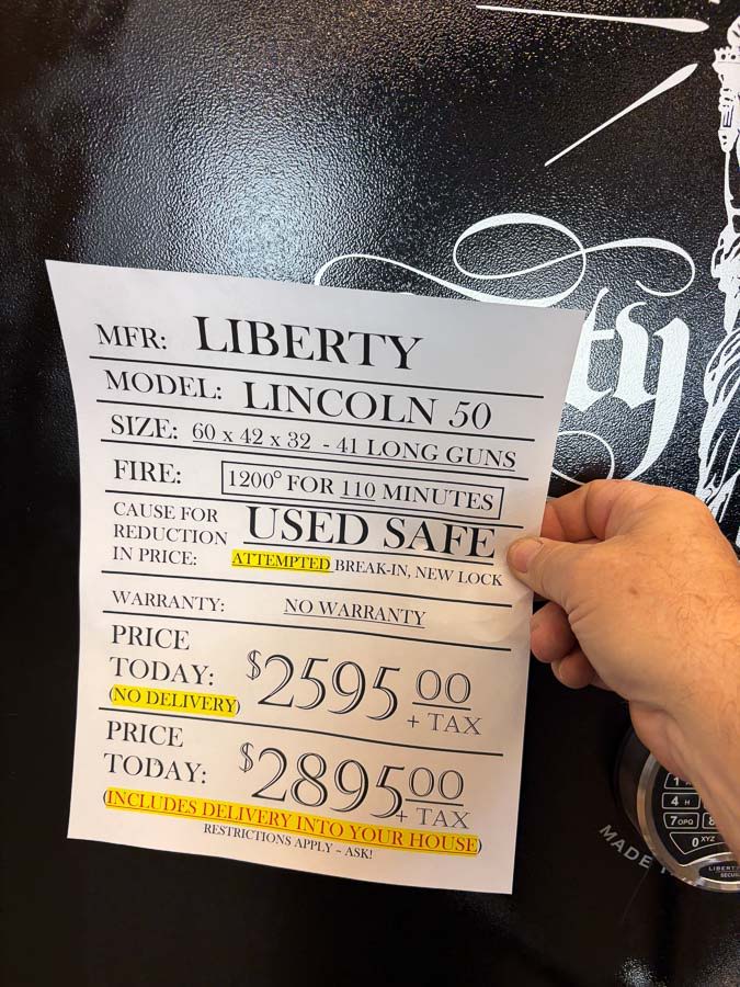 LIBERTY LINCOLN 50 gun safe exterior with sale price tag on door - SES spring cleaning sale