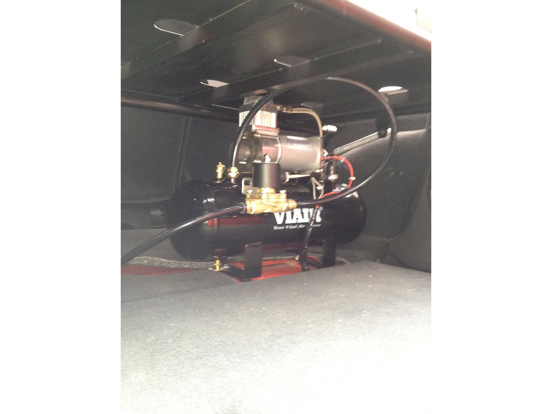 Train horn bells bracket installed John and Laurie Jeep Wrangler frame rail area Conductor's Special 228H photo 5